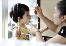 mother-feeding-boy